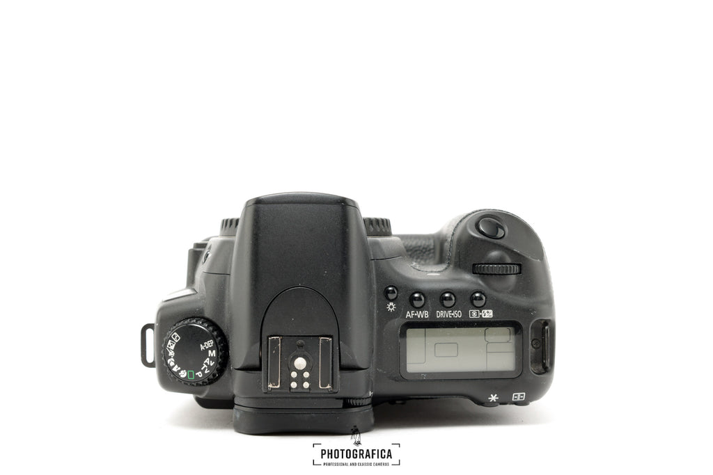 CANON EOS 20D + Canon BG-E2