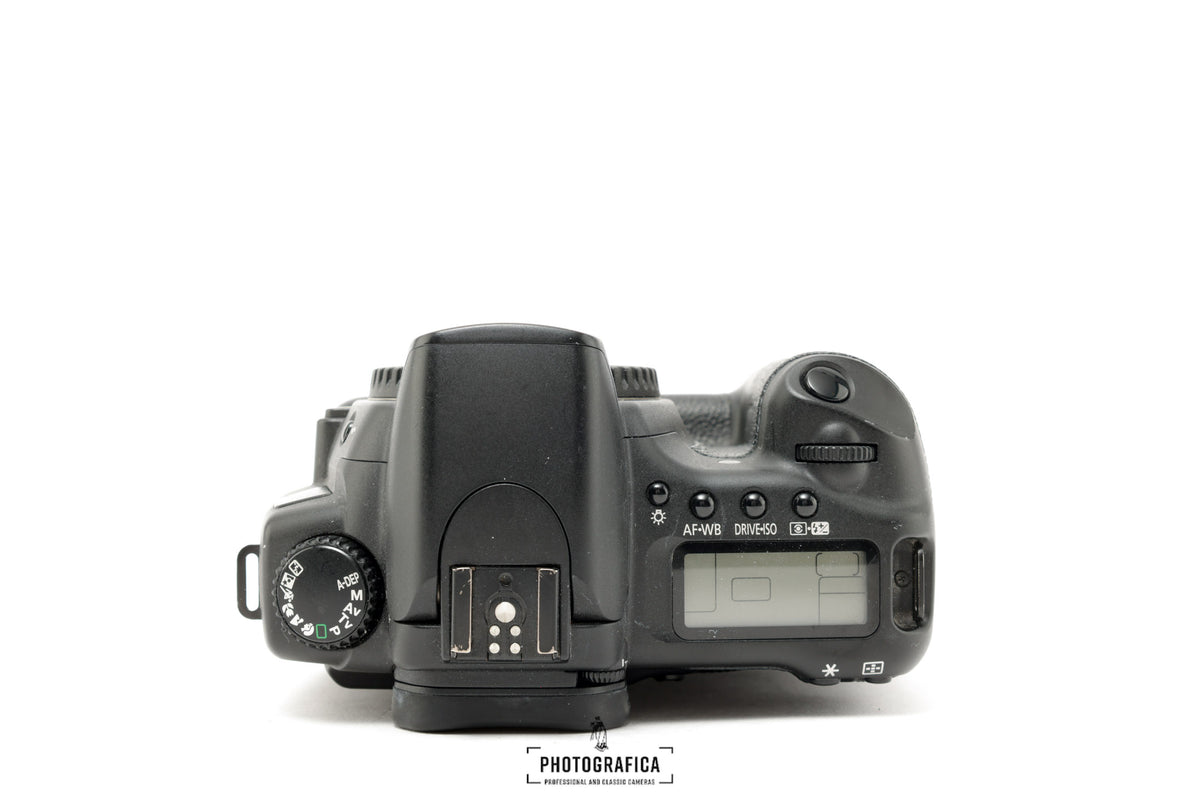 CANON EOS 20D + Canon BG-E2